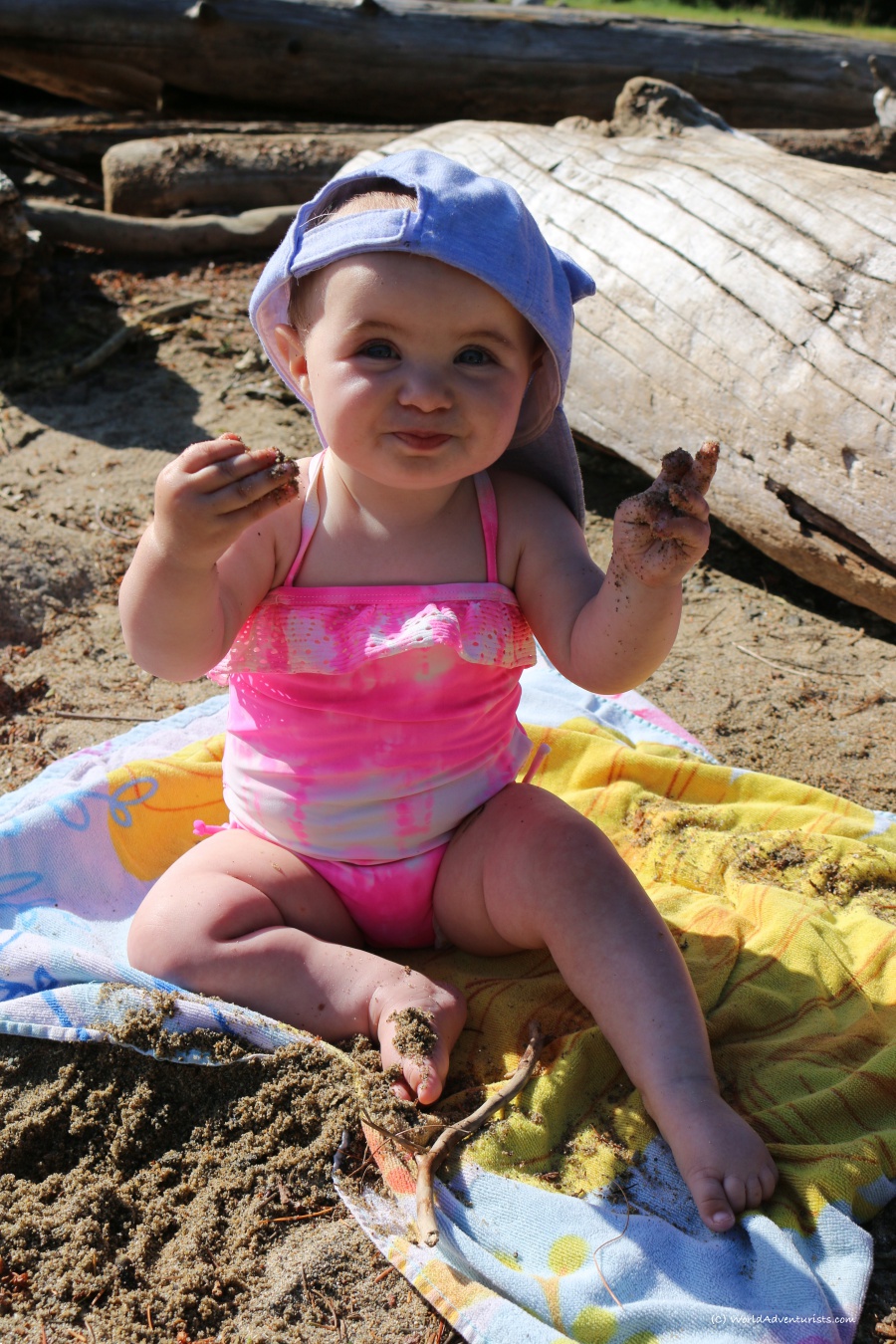 Baby enjoying the sand at Birkenhead Lake in Pemberton, BC
