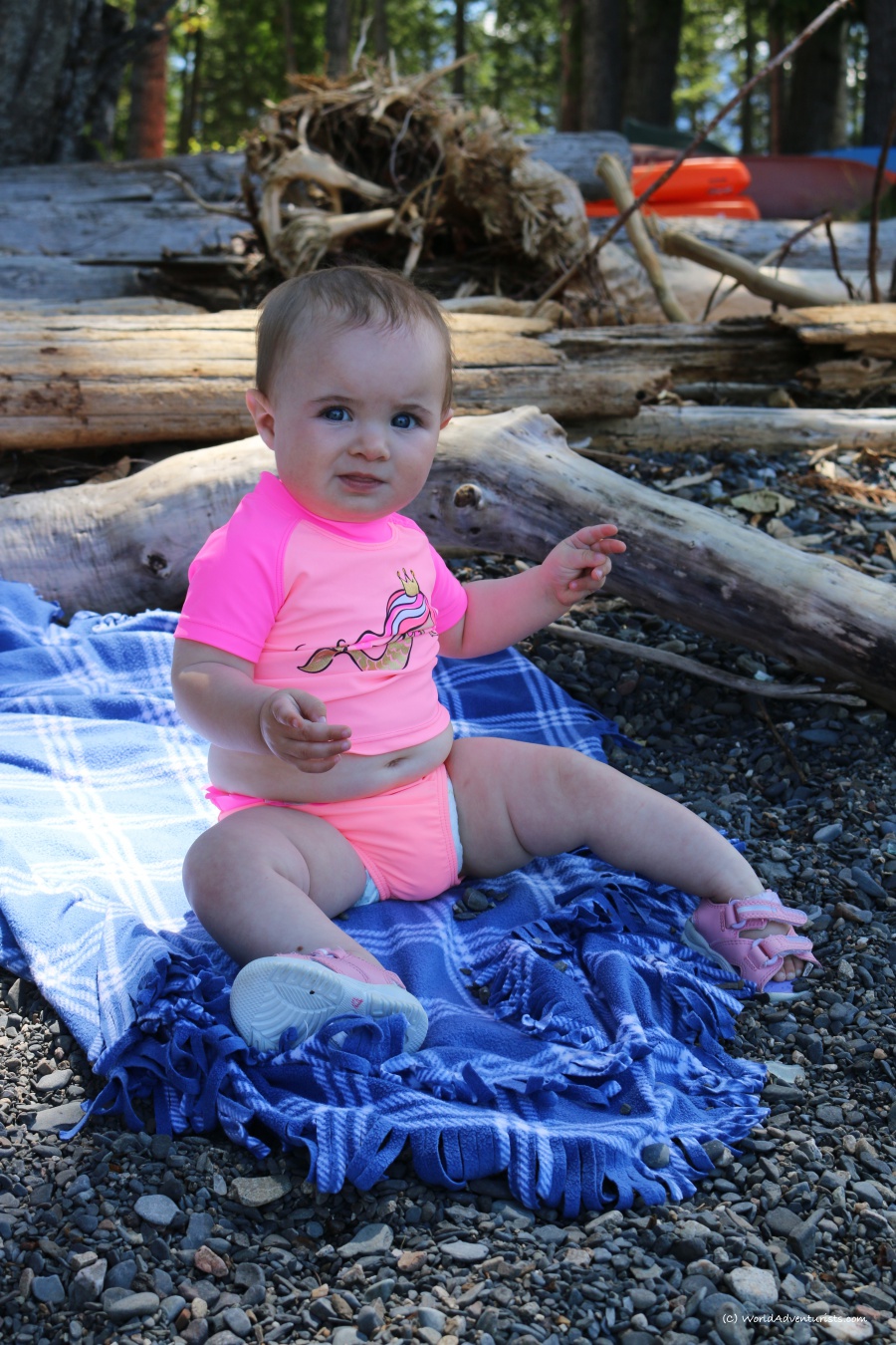 Baby enjoying the beach area of Slocan Lake in New Denver