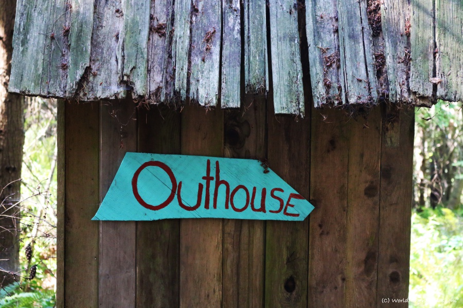An outhouse at a rustic cabin in the woods on Galiano Island 