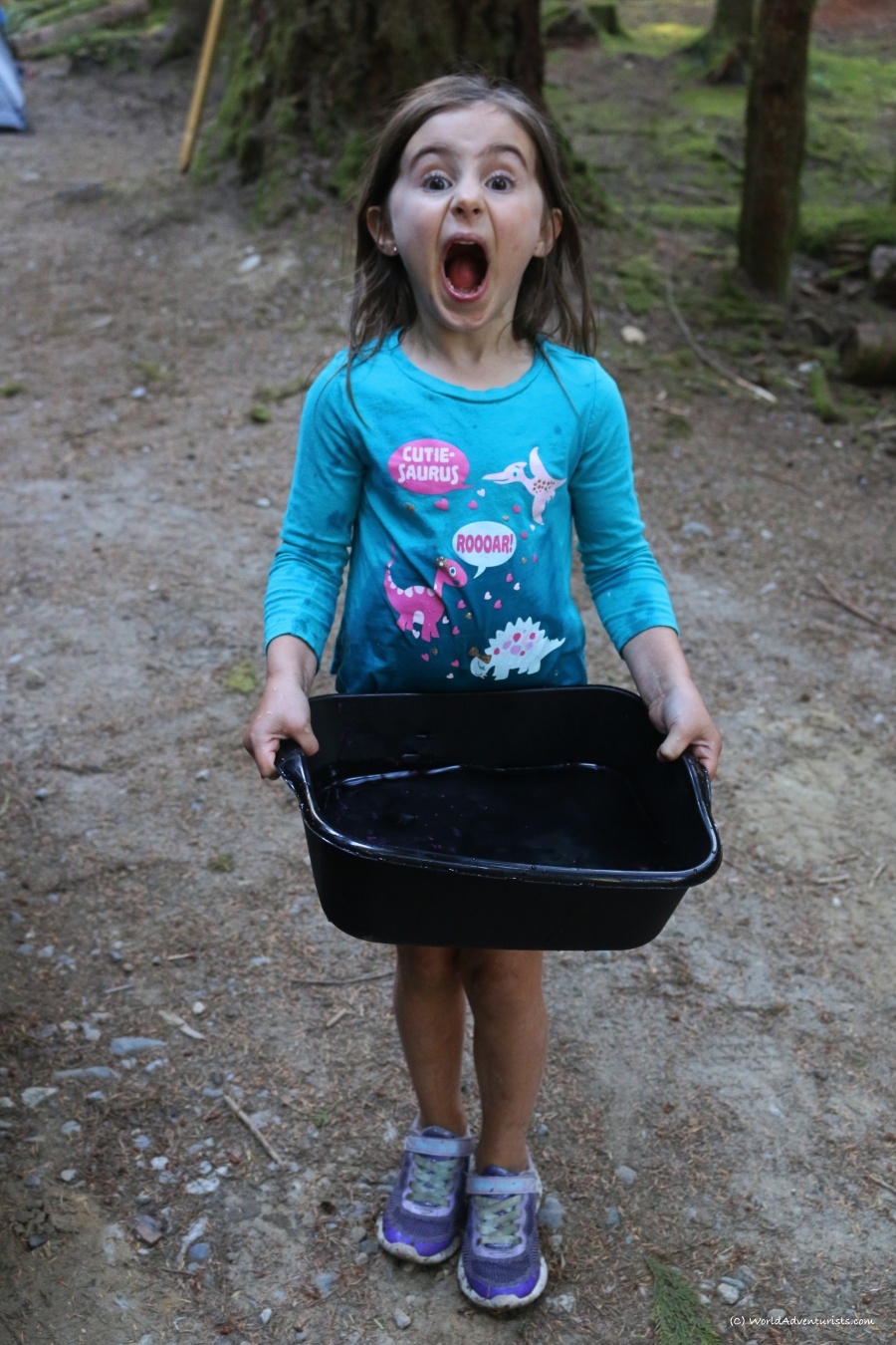 Kid filling water at campsite at Golden Ears Provincial Park